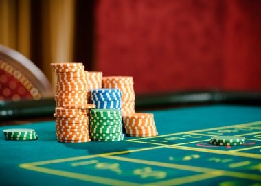 Live dealer roulette wheel spinning in multi-camera studio